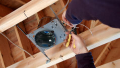 electrician installing light system
