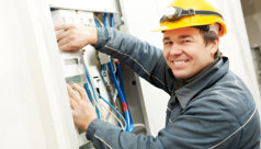 electrician checking the electric meter